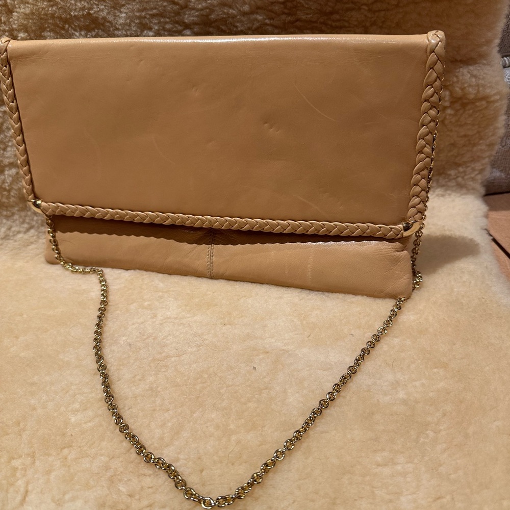 “Stylish Rodo convertible leather envelope clutch made in Italy.